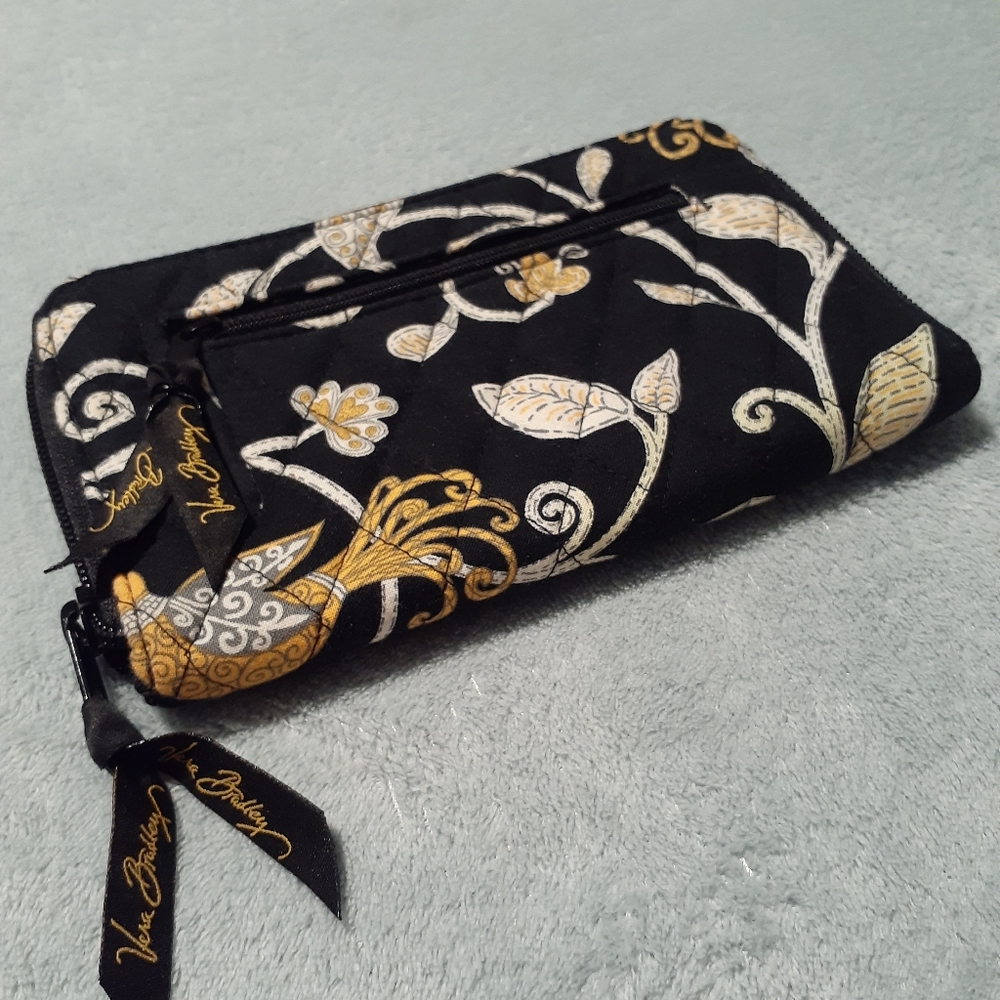 An original Vera Bradley handbag and clutch wallet